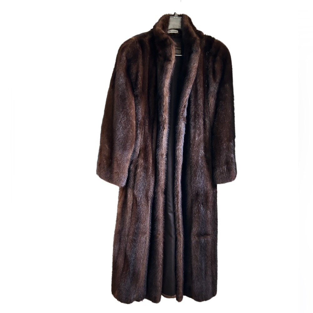 Full length mink coat with 3 hidden closures. I am 5’1” the hem 2” above ankle